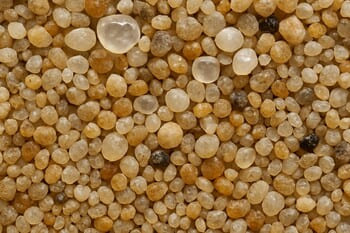 Kum filtre taneleri: farklı tane boyutları yakın plan